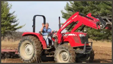 John on tractor - commitment to food safety